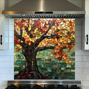 May include: A mosaic tile backsplash featuring a stylized tree with fall foliage in shades of orange, yellow, and red. The tree is set against a background of green and blue tiles.