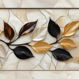 May include: A decorative wall art piece featuring a stylized branch with black, gold, and white leaves on a white background.