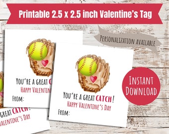 May include: Valentine's Day tag with a softball theme. The design features a yellow softball in a brown glove with a red heart. Text reads "You're a Great Catch! Happy Valentine's Day" and "Printable 2.5 x 2.5 inch Valentine's Tag".