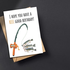 May include: A white card with the text "I hope you have a reel good birthday!" and a cartoon illustration of a fishing rod with three fish on the line.