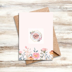 May include: A pink and white floral design card with a gold geometric frame and the text "Darling Delight Art Co." in a circle.