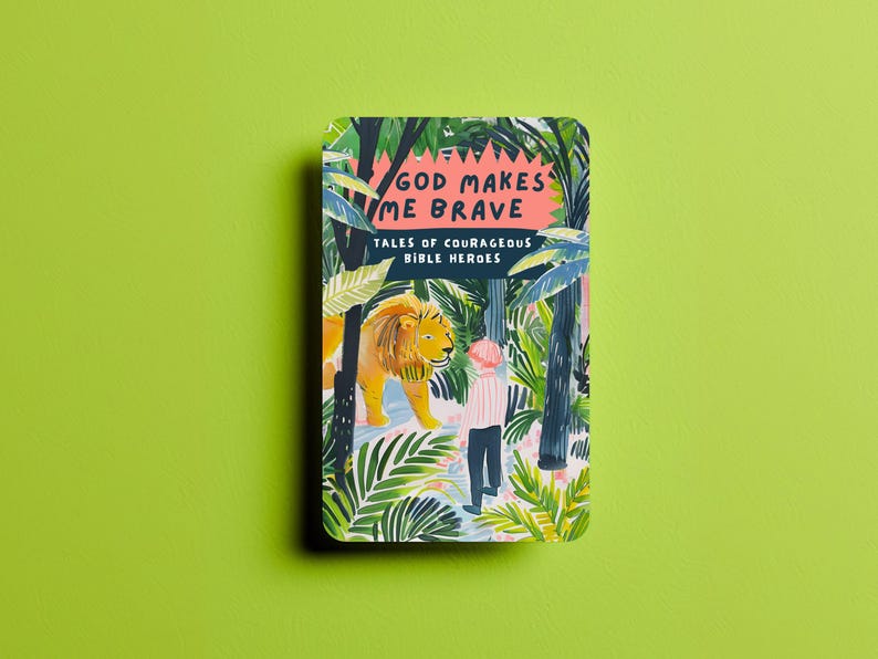 May include: A book cover with a jungle scene featuring a lion and a person. The title of the book is "God Makes Me Brave: Tales of Courageous Bible Heroes."