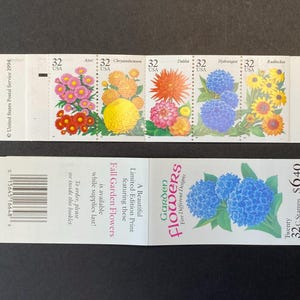 May include: A sheet of twenty 32-cent stamps featuring five different flower designs. The stamps are a limited edition print and feature a variety of fall garden flowers, including asters, chrysanthemums, dahlias, hydrangeas, and rudbeckia.