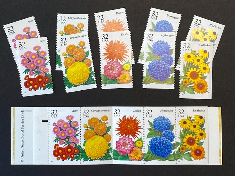 May include: A sheet of 10 United States Postal Service stamps featuring different flowers. The stamps are from 1994 and each stamp has a value of 32 cents. The flowers featured are Aster, Chrysanthemum, Dahlia, Hydrangea, and Rudbeckia.