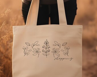 Bolsa de lona de algodón con diseño floral minimalista y líneas botánicas