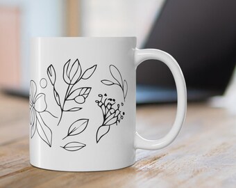 Taza con arte lineal botánico: Taza de café floral minimalista, 325 ml