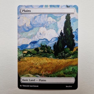 May include: A collectible card featuring a landscape painting in the style of Vincent van Gogh. The artwork depicts a field of wheat, green trees, and a cloudy blue sky. The card is labeled "Plains" and "Basic Land - Plains."