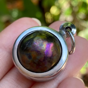 Leklai “Flowing Metal” Pendant in Stainless Steel Frame – Thai Sacred Metallic Stone for Protection, Luck, Spiritual Strength Energy Buddha