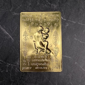 Gold In Khu Thai love amulet card, 5x8cm charm for attraction, romance, and spiritual binding—used in ancient Thai love rituals.