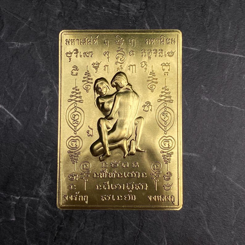 Gold In Khu Thai love amulet card, 5x8cm charm for attraction, romance, and spiritual binding—used in ancient Thai love rituals.