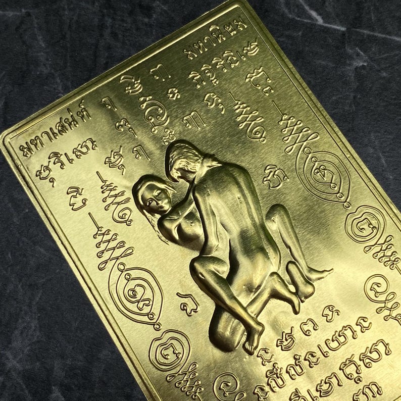 Gold In Khu Thai love amulet card, 5x8cm charm for attraction, romance, and spiritual binding—used in ancient Thai love rituals.