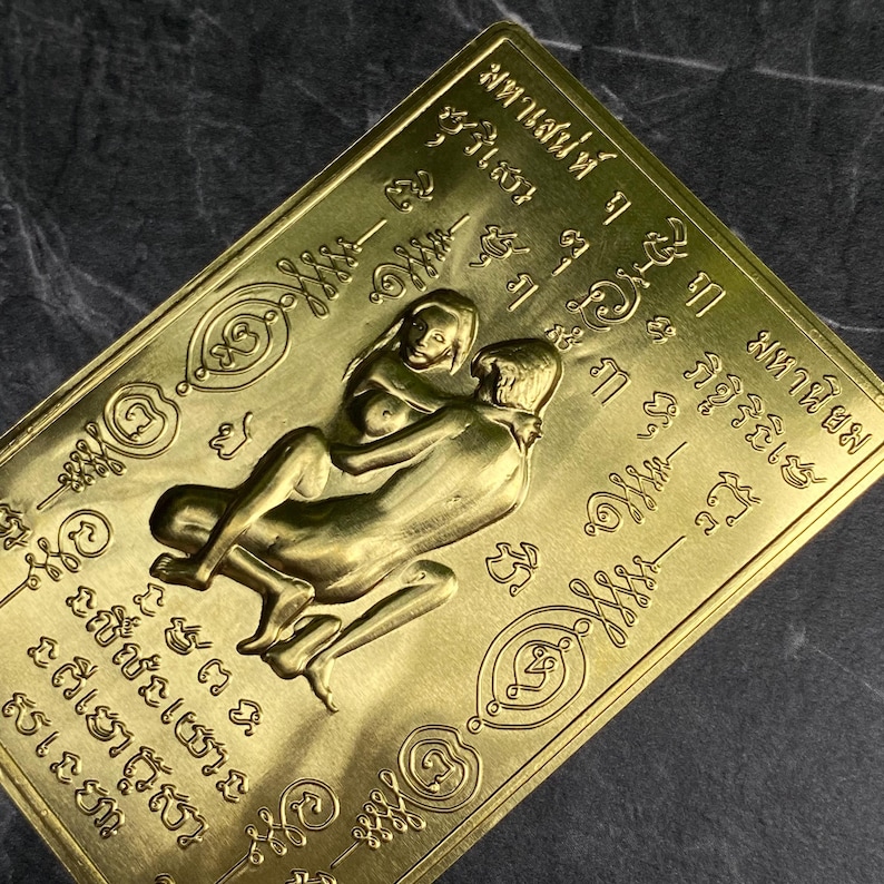Gold In Khu Thai love amulet card, 5x8cm charm for attraction, romance, and spiritual binding—used in ancient Thai love rituals.