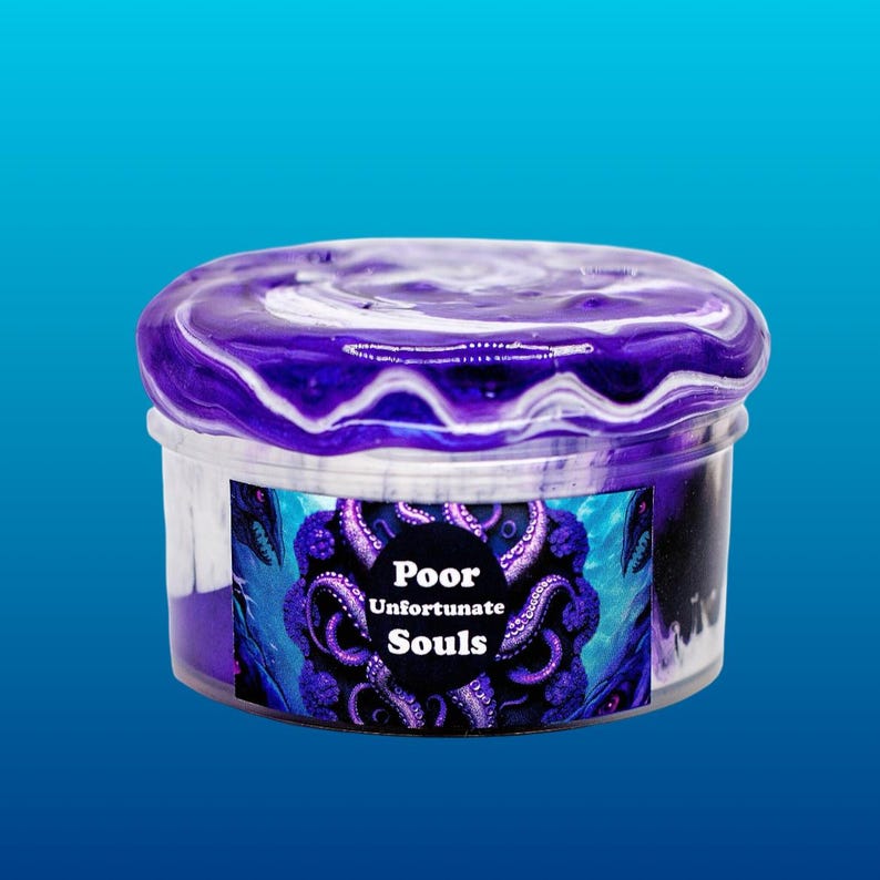 May include: A clear plastic container filled with purple and white slime. The container has a label that reads "Poor Unfortunate Souls" with an illustration of an octopus.