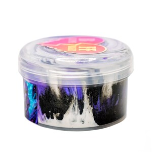 May include: A clear plastic container filled with black, white, and purple slime. The container has a label that says "The Slime Bar".