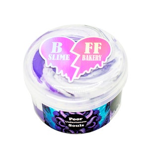 May include: A clear plastic container filled with purple and white slime. The container has a label that says "BFF Slime Bakery" with a broken heart design. The label also says "Poor Unfortunate Souls".