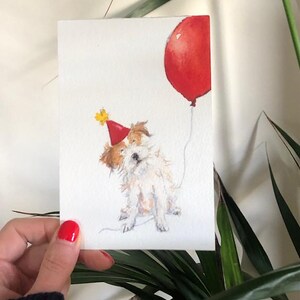 Cartolina con cane da festa dipinta a mano