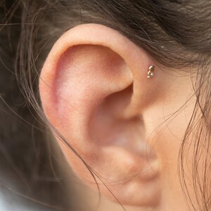 Helix and antihelix piercing sale
