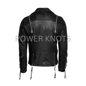 May include: Black leather motorcycle jacket with zipper details and a 'POWER KNOTS' logo on the back.