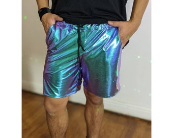 May include: A pair of iridescent blue and green shorts with a drawstring waist.