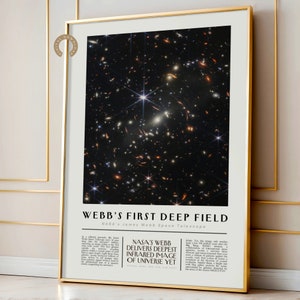 May include: A black and white poster with a colorful image of a galaxy in the upper half. The lower half of the poster has white text on a black background that reads "WEBB'S FIRST DEEP FIELD NASA's James Webb Space Telescope NASA'S WEBB DELIVERS DEEPEST INFRARED IMAGE OF UNIVERSE YET"