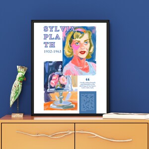 May include: A colorful poster featuring a portrait of Sylvia Plath, a famous American poet. The poster has a pink, yellow, and blue color scheme and includes a quote from Plath's work: "I took a deep breath and listened to the old brag of my heart. I am, I am, I am."