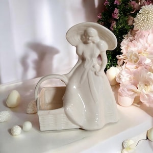 May include: A rustic wooden sign with the text "Welcome to our home" in white lettering. The sign features a distressed finish and a simple, inviting design, perfect for a front porch or entryway.