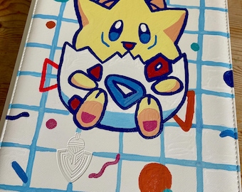 Togepi inspired Pokemon card binder. 9 pocket 360 card capacity