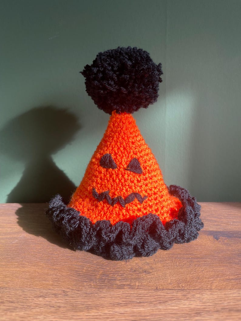 Handmade, reusable crochet birthday/ party hat (clown hat) - customisable orange and black