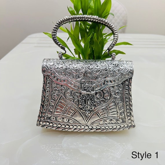 German Silver Handle Clutch