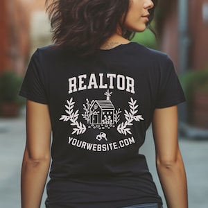 May include: Black t-shirt with a white graphic design of a house with keys and the text "REALTOR YOURWEBSITE.COM"
