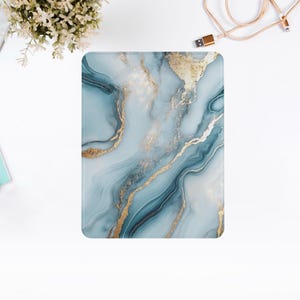 May include: A blue and gold marble pattern phone case. The case has a swirling pattern of blue and white marble with gold accents.
