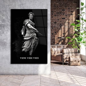 May include: Black and white image of a Roman statue of a man in a toga, with the text "VENI VIDI VICI" below the statue.