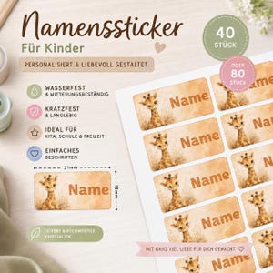 May include: A sheet of rectangular name stickers featuring a watercolour giraffe illustration and the text Name. Each sticker measures 31mm by 15mm. The sheet includes options for 40 or 80 pieces, with German text detailing features like waterproof, scratch-resistant, and durable qualities.