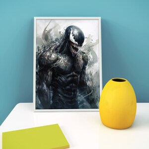 May include: A framed print of a black and white illustration of Venom, a Marvel Comics superhero, with a menacing expression. The background is a watercolor-style wash of gray and white.