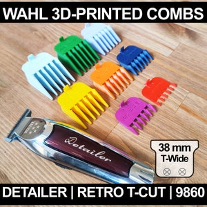 May include: A set of 3D-printed combs for hair clippers in various colours, including blue, green, orange, purple, and pink. The combs are labelled with their sizes in millimetres. The image also shows a Wahl Detailer Retro T-Cut 9860 hair clipper.