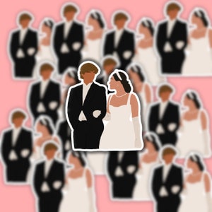 May include: A digital illustration of a couple in formal attire. The man is wearing a black suit with a white shirt and a black tie. The woman is wearing a white dress with a white sash and a white headband. The couple is standing in front of a pink background.