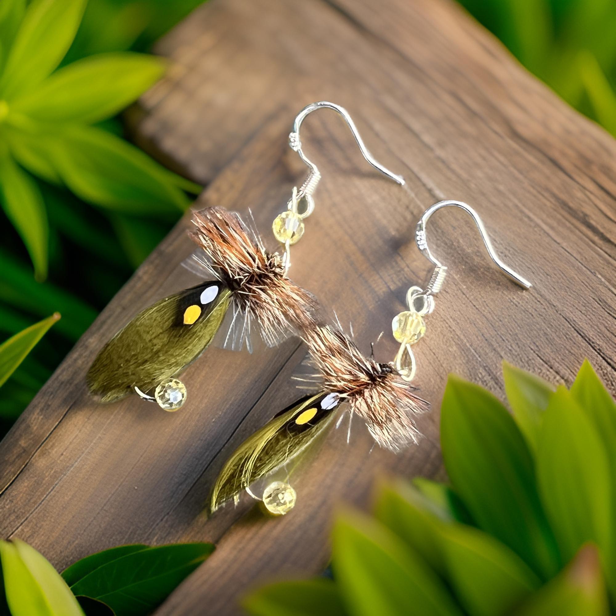 More in stock! These fly fishing earrings are a shop favorite.  A green Hornberg fly pattern w/4 round pale yellow Swarovski crystal beads.
