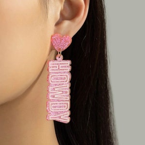 Pink glitter Howdy earrings
