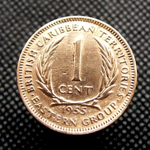 TERRITORI CARAIBICI BRITANNICI - Moneta da un centesimo del 1955 - Regina Elisabetta II - Autentica amministrazione britannica - Moneta in bronzo (OS01)
