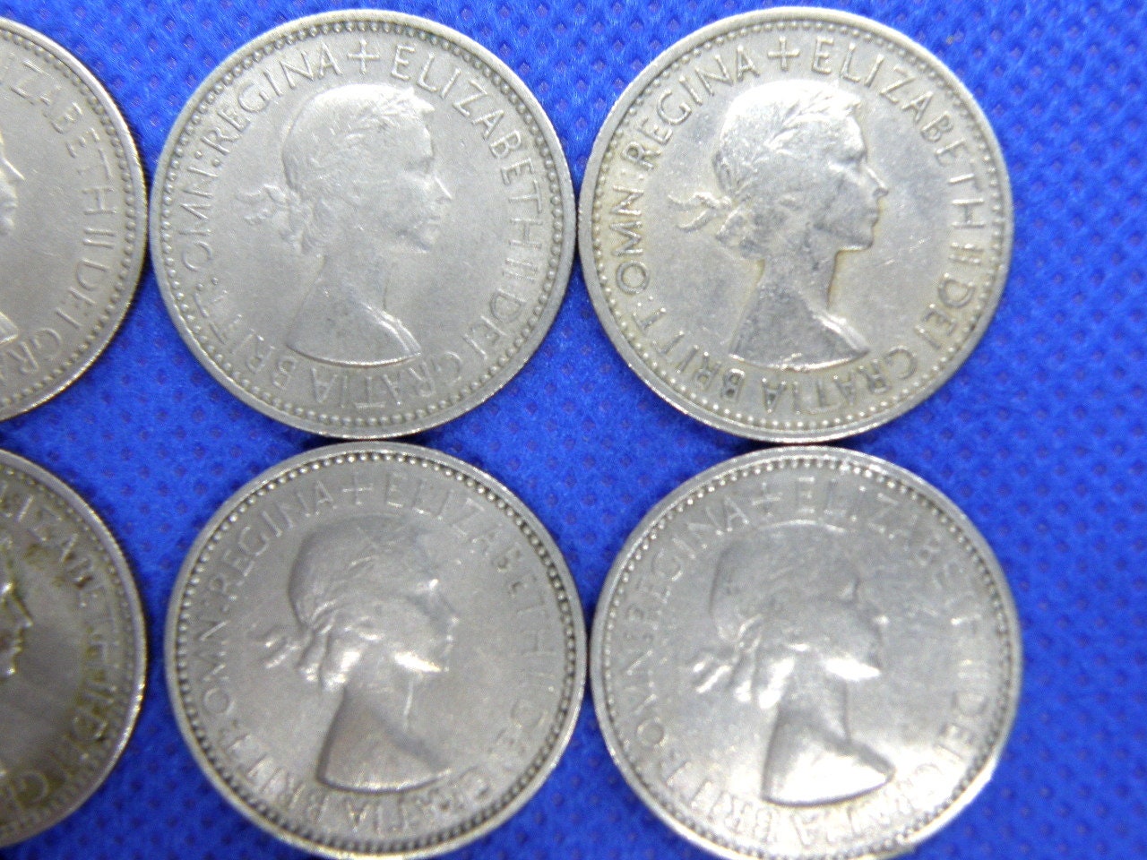 1953 年 1 シリング硬貨 12 枚 - イギリス 3 頭のライオンの盾の
