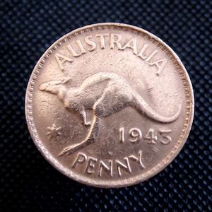 Moneta da un penny australiano del 1943: Re Giorgio VI, canguro che salta
