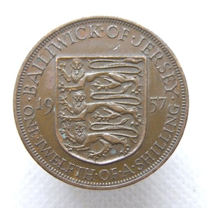MONETA DA PENNY DEL JERSEY DEL 1957 - Disegno con scudo a tre leoni - Isole del Canale - Scellino britannico pre-decimale originale da 1/12 - Bronzo (OS01.1)