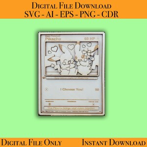 May include: A wooden Pokemon card featuring Pikachu with a brown background. The card has the text "Basic Pokemon Pikachu 60 HP" and "I Choose You! 80".