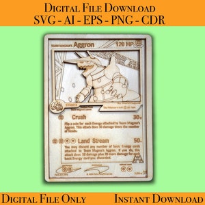 May include: Laser-cut wooden Pokémon card featuring Aggron, with the text "Team Magma's Aggron" and "120 HP." The card includes attack descriptions and is a digital file download. The text "DIGITAL FILE DOWNLOAD" and "INSTANT DOWNLOAD" are also visible.