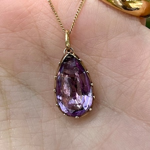 Chipped Georgian foiled-back amethyst teardrop pendant in cut down collet setting
