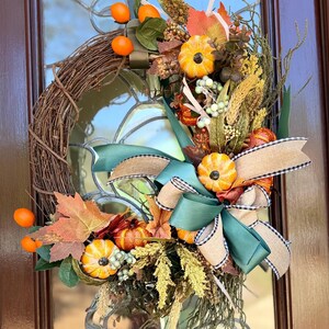 Fall Farmhouse Wreath with Orange Pumpkins, Greenery, fall picks, wheat  and matching bow. Thanksgiving harvest, Fall front door wreaths.