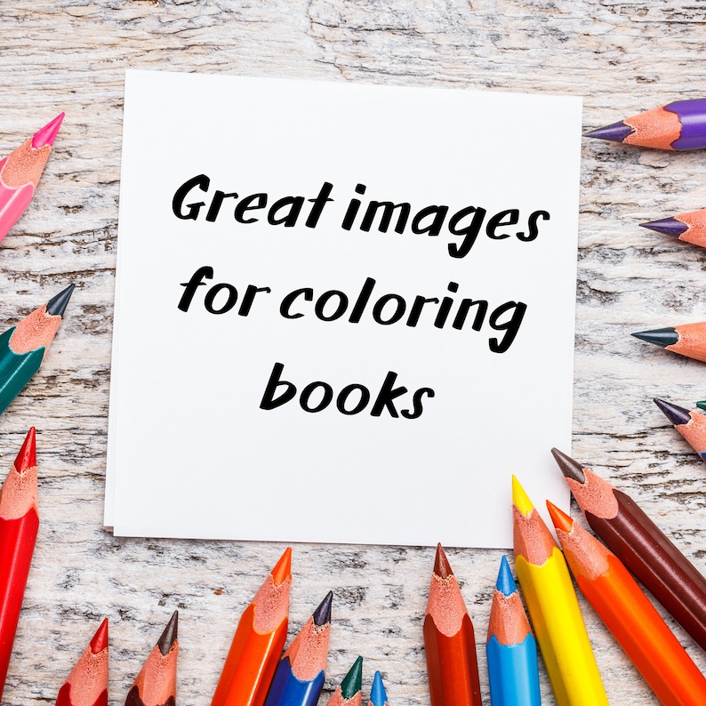 May include: A white card with the text "Great images for colouring books" on a wooden background with coloured pencils around the card.