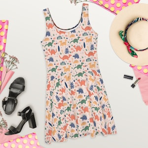 Cute and Colorful Dino Print Skater Dress - Perfect for a Playful Look - Mid-Thigh Length Flared Skirt - Add Some Fun to Your Wardrobe!