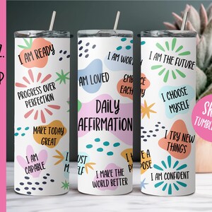 May include: Three 20 ounce skinny tumblers with colorful abstract designs and positive affirmations. The tumblers feature phrases like "I am ready", "I am loved", "I am the future", and "Daily Affirmation".