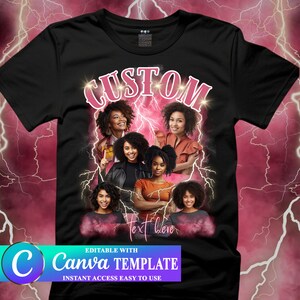 May include: Black t-shirt with a pink "CUSTOM" graphic featuring a group of women with curly hair. The graphic is surrounded by pink lightning bolts and the text "Text Here" is at the bottom.